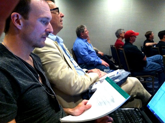 Dave Berri and Stefan Szymanski listening to the first talk